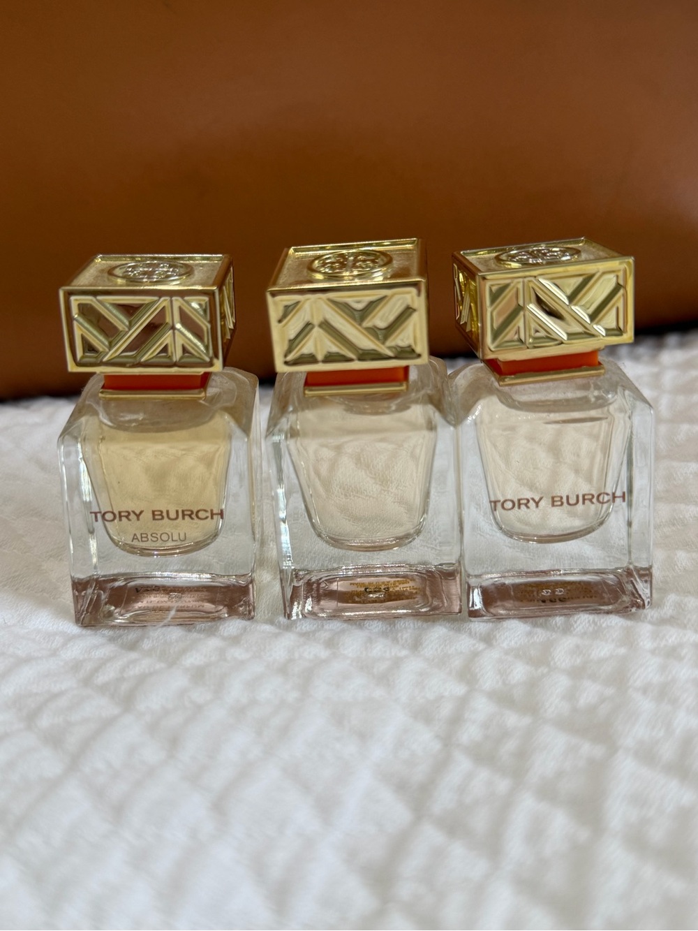 Tory Burch Glass Perfume Bottles with Gold Caps and Neutral Glass